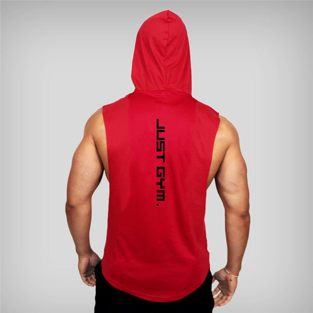 A fit person wearing a red sleeveless hoodie with "JUST GYM." printed vertically on the back, viewed from behind.