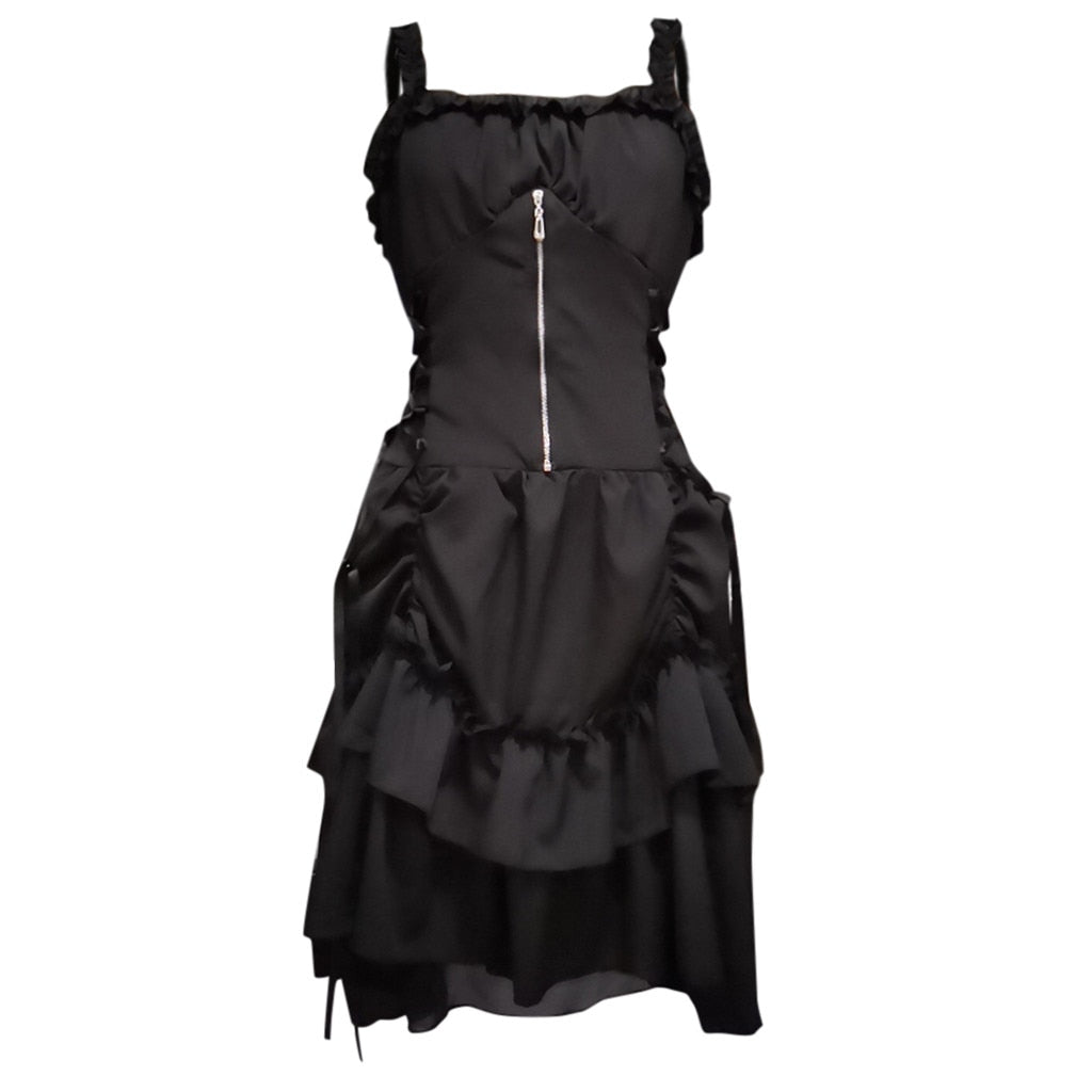 A black, sleeveless gothic dress featuring ruffled straps, a silver zipper on the bodice, and layered, asymmetrical ruffled skirt, conveying an edgy vibe.
