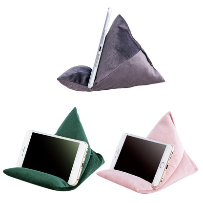 A colorful set of triangular phone stands in gray, green, and pink, each holding a smartphone at a comfortable viewing angle.