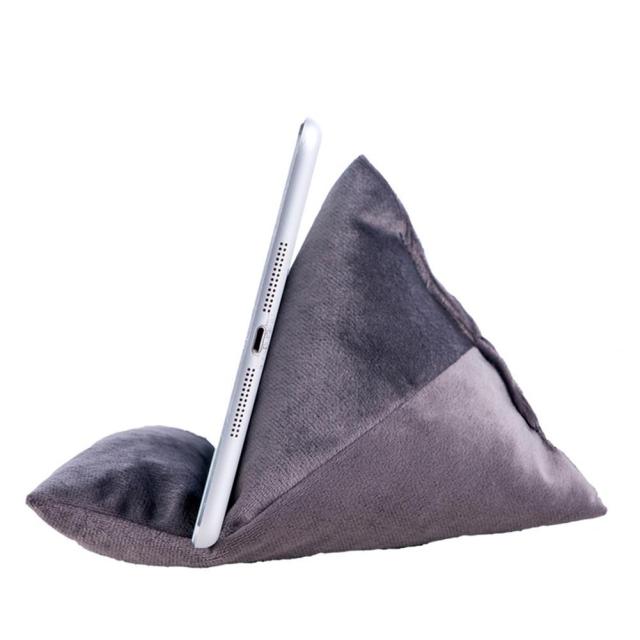 A gray triangular tablet holder supports a sleek tablet, providing a stable viewing angle. Ideal for hands-free use.