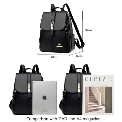 A stylish black backpack with gold accents, shown beside an iPad and an A4 magazine for size comparison. Dimensions noted are 32cm x 26cm x 14cm.