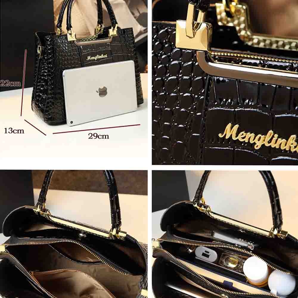 A stylish black handbag with a crocodile texture, featuring a gold logo and spacious interior for a tablet and accessories.