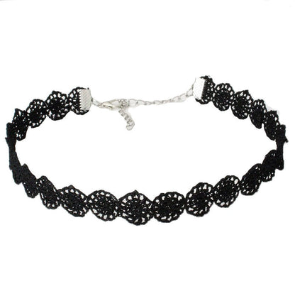Black lace choker with intricate floral design and silver chain clasp, set against a white background, conveying elegance and a vintage feel.