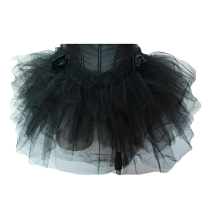Black tutu skirt with layered tulle, creating a voluminous, elegant look. The fabric is rich and textured, conveying a sense of drama and sophistication.
