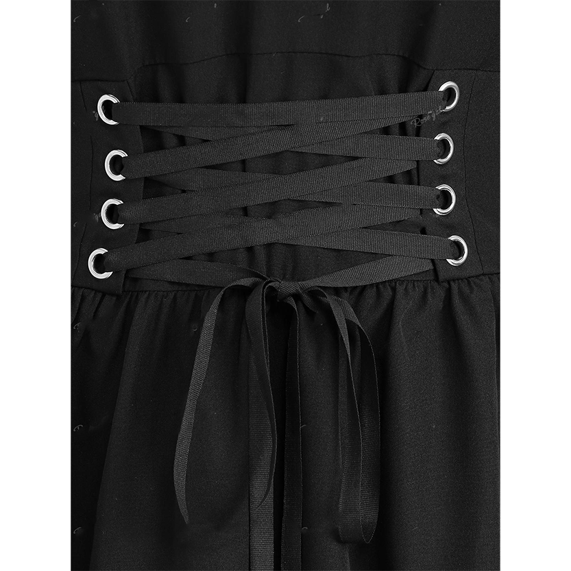 Close-up of a black corset-style dress with crisscrossed lacing through silver eyelets. The fabric has a gathered texture, creating a structured, elegant look.