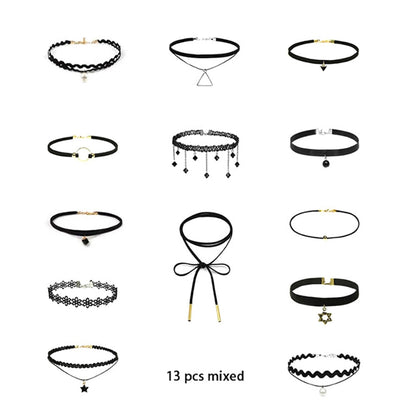 Collection of 13 black chokers featuring varied designs with pendants and lace. Arranged on a white background, showcasing different styles.