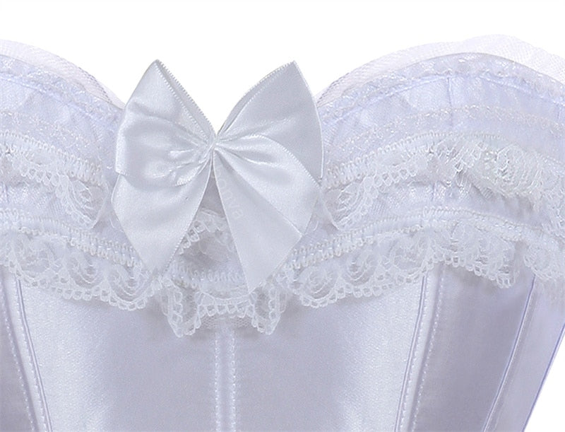 Corset top in white satin with lace trim and a large satin bow. The fabric appears elegant, with a delicate and feminine design.