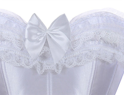 Corset top in white satin with lace trim and a large satin bow. The fabric appears elegant, with a delicate and feminine design.