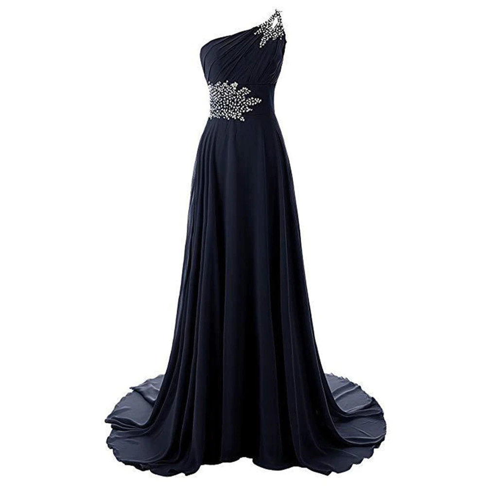Elegant black evening gown with an asymmetrical neckline, adorned with sparkling silver embellishments on the shoulder and waist. Flows gracefully.