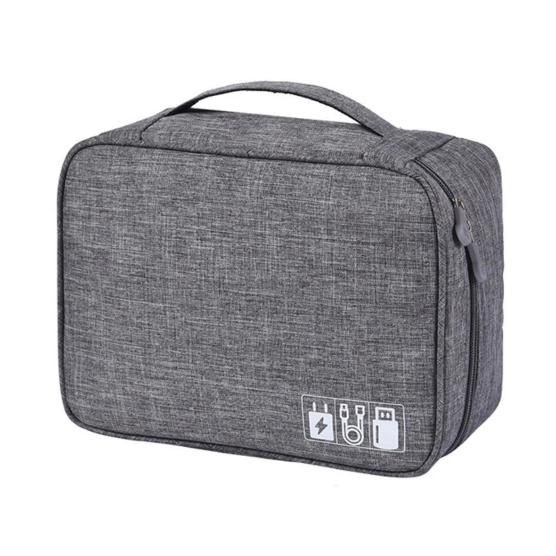 Gray accessory organizer bag with a sturdy handle and icons for charging cables, designed for travel and convenience.