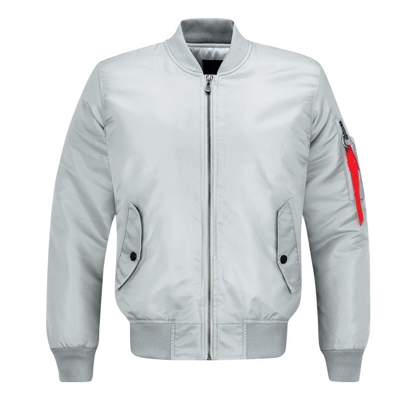 Gray bomber jacket with a front zipper, side pockets, and ribbed collar and cuffs. It has a red tag on the sleeve, giving a sleek, modern look.