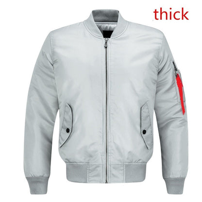 Gray bomber jacket with front zipper and two side pockets, featuring a red zipper detail on the sleeve. The word "thick" appears in red text.