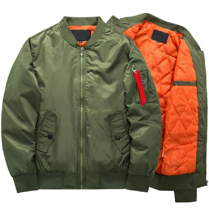 Green bomber jacket with an orange quilted lining on display, featuring a front zipper, two buttoned side pockets, and a zippered sleeve pocket.