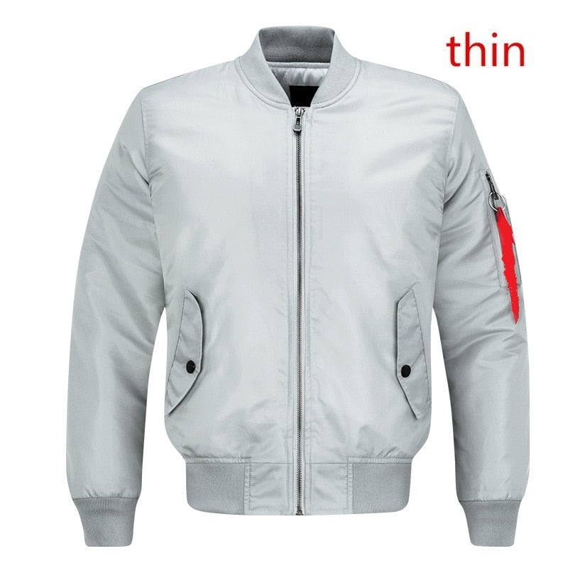 Light gray bomber jacket with a front zipper, buttoned side pockets, and a red detail on the sleeve. The word "thin" is written in the top right corner.