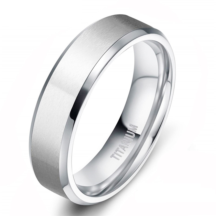 Silver titanium ring on a white background