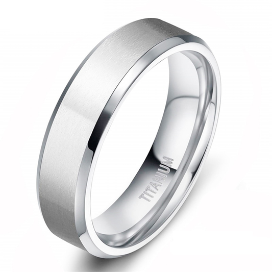Silver titanium ring on a white background