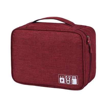 Red fabric organizer bag with a handle, featuring white icons for charging accessories and cables on the front.
