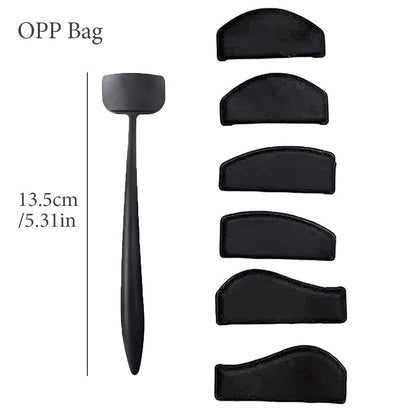 Set of black nose contour tools including a 13.5cm sculpting stick and six nose pads of varying shapes, displayed on a white background.