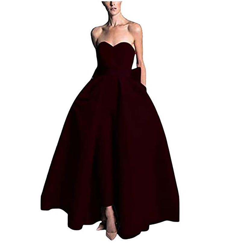 Strapless dark burgundy ball gown with a fitted bodice and voluminous skirt. The dress exudes elegance and sophistication, perfect for formal events.
