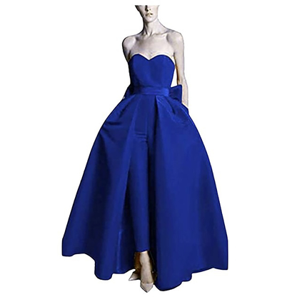 Strapless royal blue gown with a sweetheart neckline, full skirt, and slim pants underneath. Elegant, modern design exudes confidence and style.