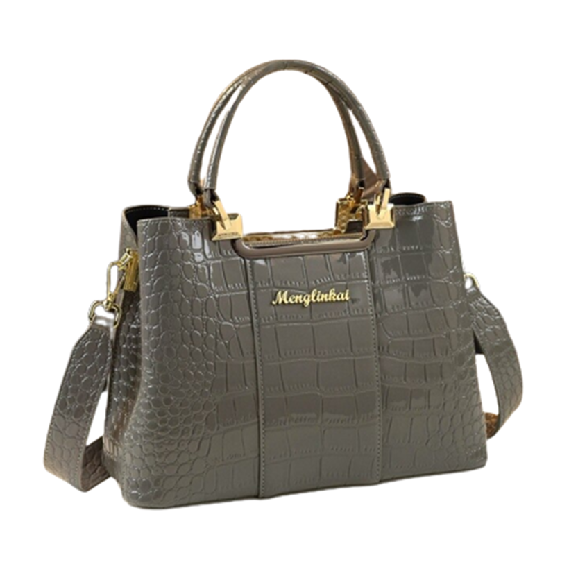 Stylish gray handbag with a crocodile texture, featuring gold accents and a detachable strap, perfect for chic outings.