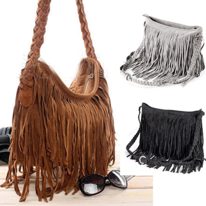 Three stylish fringe handbags in brown, gray, and black, with braided straps, displayed alongside a pair of sunglasses.