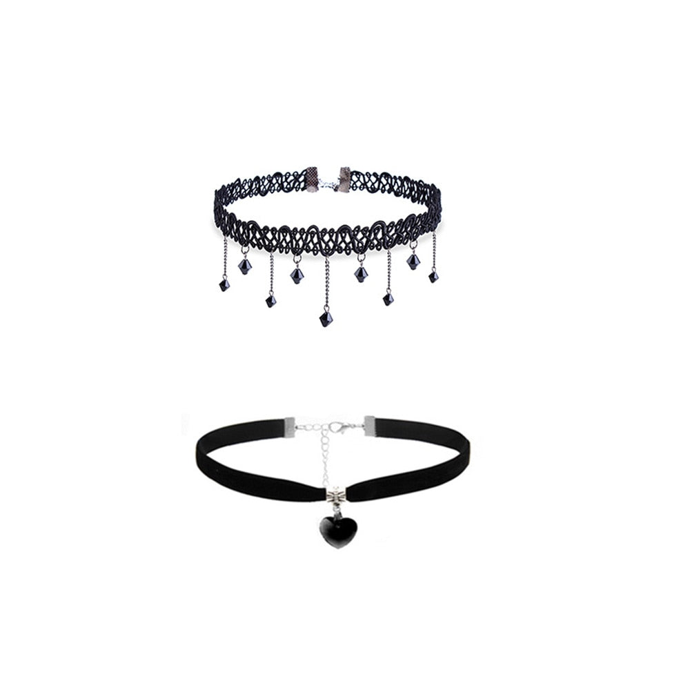 Two black chokers are displayed on a white background. The top choker features lace and dangling beads, while the bottom has a smooth band with a heart charm. Both convey elegance.