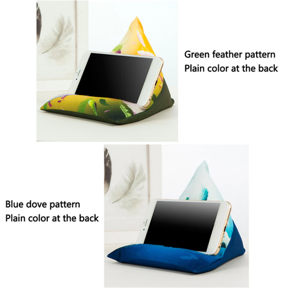 Two phone holders: one with a green feather pattern and one with a blue dove pattern, both showcasing plain backs.