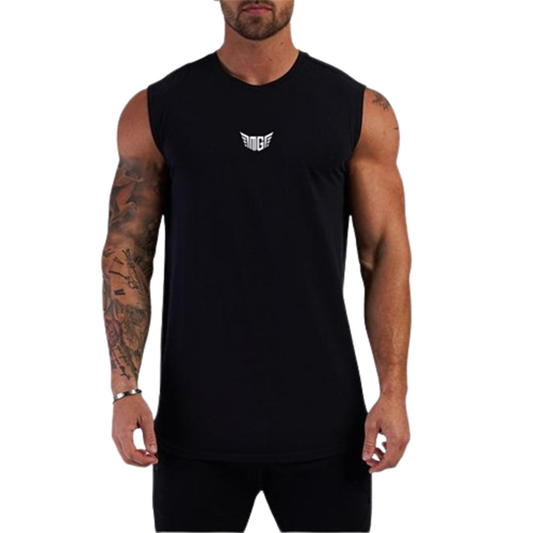 A muscular man in a black sleeveless shirt with a small white logo on the chest, showcasing his tattoos and fit physique.