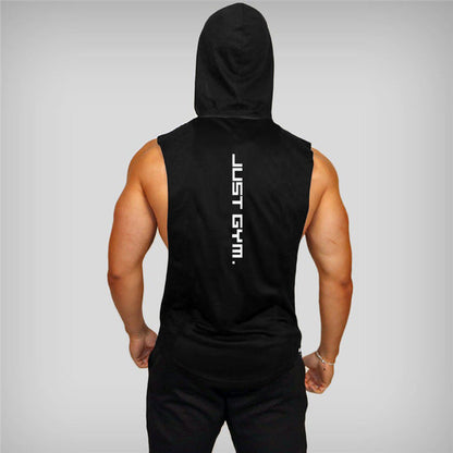 A muscular man in a black sleeveless hoodie facing away, featuring the text "JUST GYM." on the back, set against a gray background.