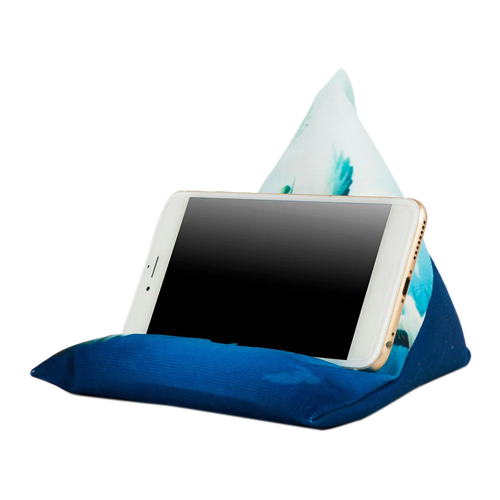 A triangular phone holder with a blue base and a patterned top, supporting a smartphone in an upright position.
