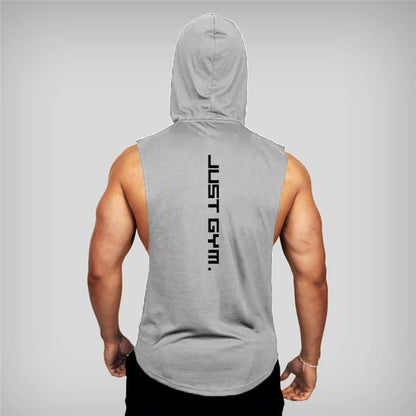 A muscular man wearing a sleeveless gray hoodie from the back, featuring the phrase "JUST GYM." prominently displayed.