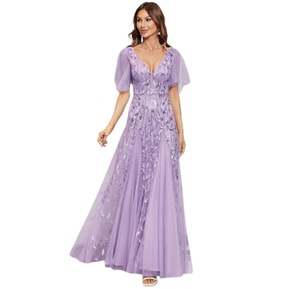 Woman in an elegant lavender evening gown with a deep V-neckline, sheer short sleeves, and floral embroidery, exuding a graceful and sophisticated vibe.