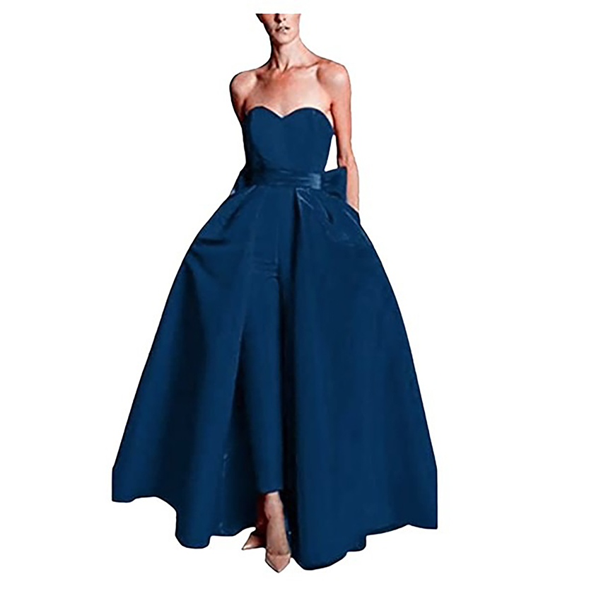 A model wearing an elegant strapless, deep blue gown with a sweetheart neckline and a full A-line skirt, conveying sophistication and grace.