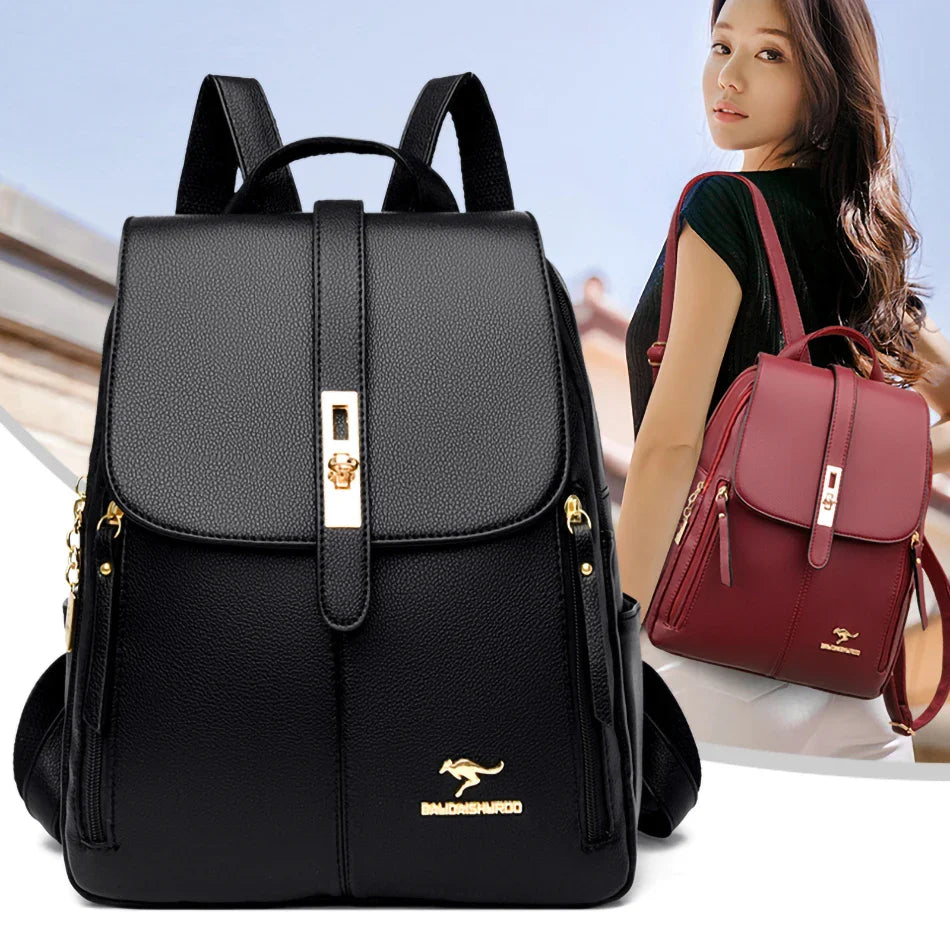 A stylish black backpack with gold accents displayed in front of a woman wearing a burgundy backpack.