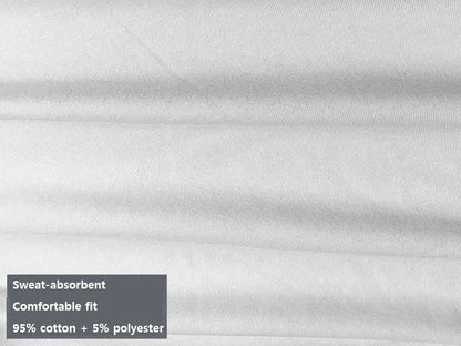 Close-up of white fabric with a smooth texture, featuring a label highlighting its sweat-absorbent and comfortable fit qualities.