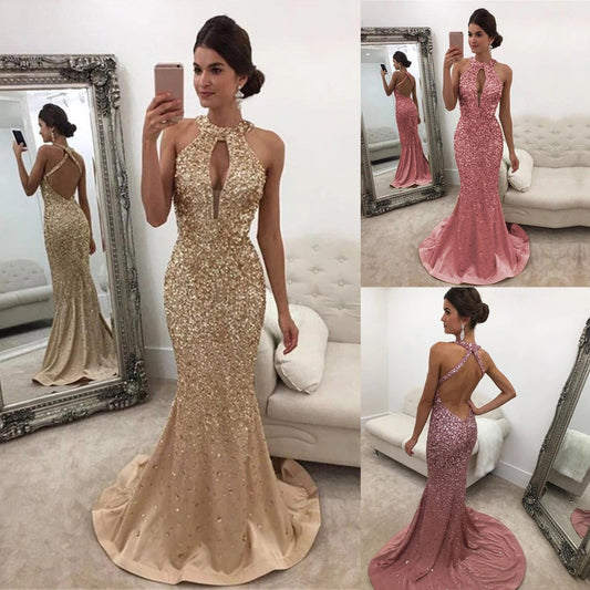 A woman wearing elegant gold and pink sequined gowns. The mood is glamorous and sophisticated.
