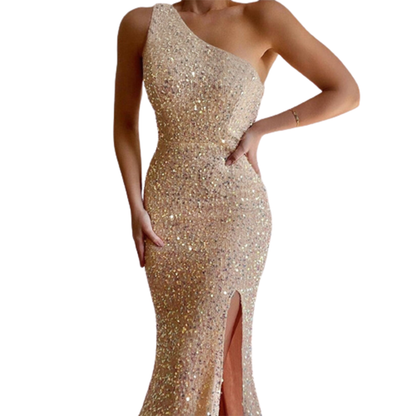 A woman wearing a shimmering, one-shoulder, gold sequin gown with a thigh-high slit. The dress exudes elegance and glamour, suitable for a formal event.