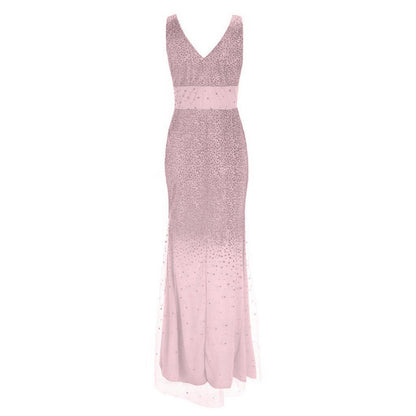 Elegant sleeveless pink evening gown with a V-neckline, featuring sparkling embellishments fading down the skirt, conveying sophistication and grace.
