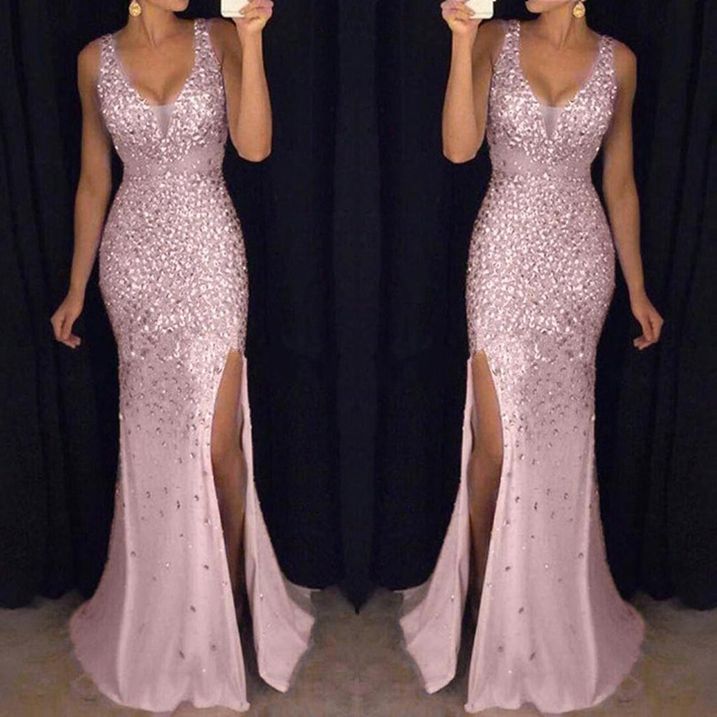 A woman in a shimmering, sleeveless pink gown with a deep v-neck and high slit stands in front of a dark background, conveying elegance and glamour.